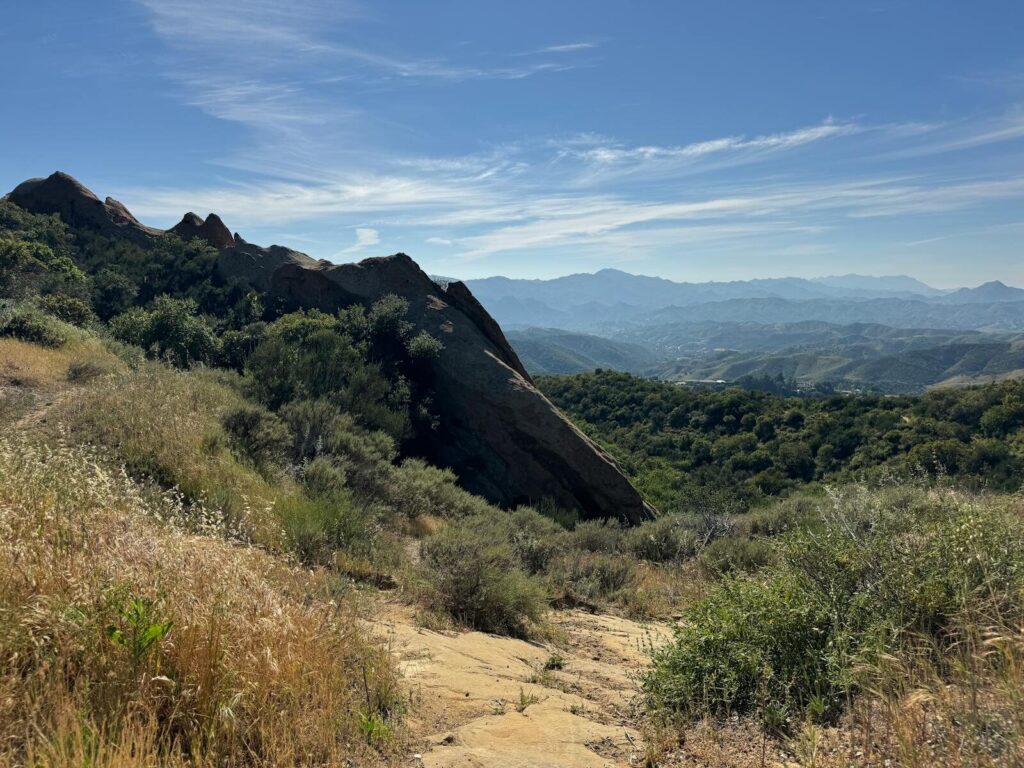Breathtaking landscape view of the Santa Monica Mountains under a clear blue sky.